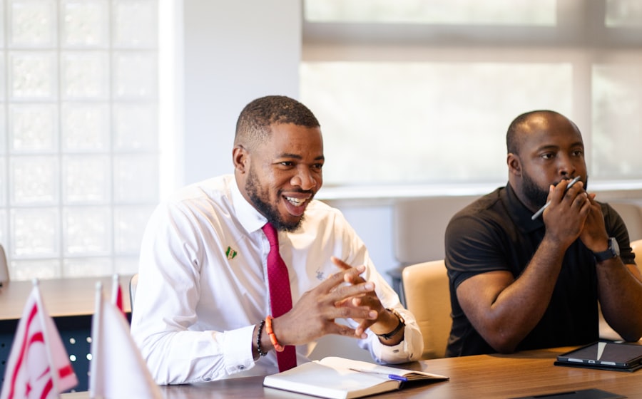 Two leaders in a strategic discussion at a conference table